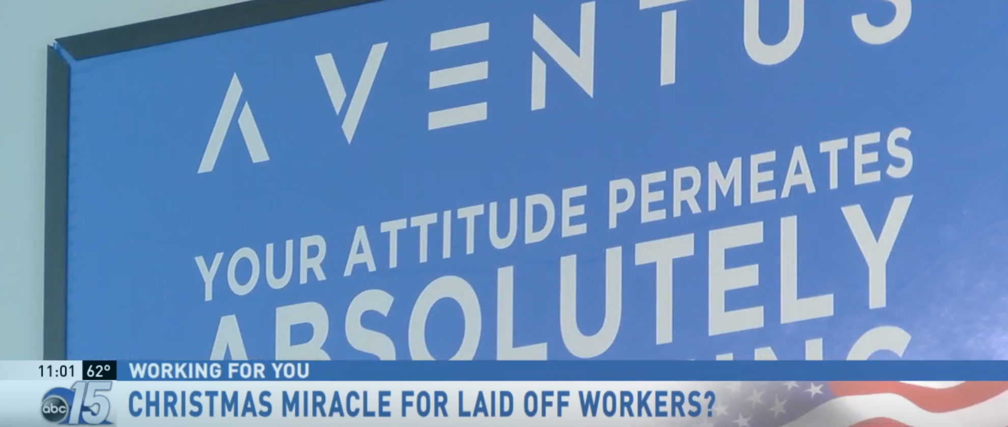 Screen capture of an abc news mention of Aventus. On screen, a company banner with the logo shows the phrase 'Your Attitude Permeates Absolutely Everything'. An overlayed header displays: 'Christmas Miracle for Laid Off Workers?'